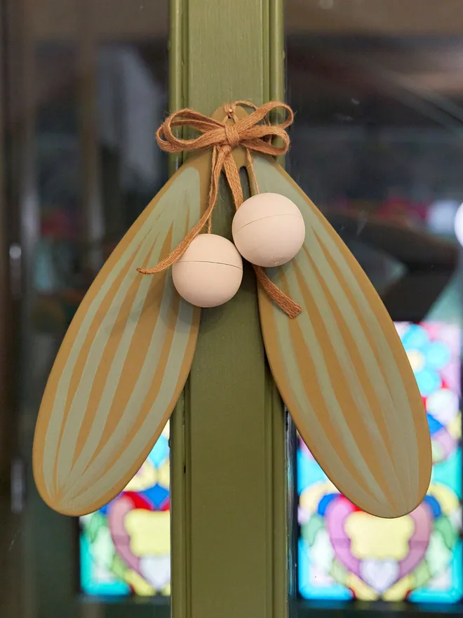 giant handpainted wooden mistletoe