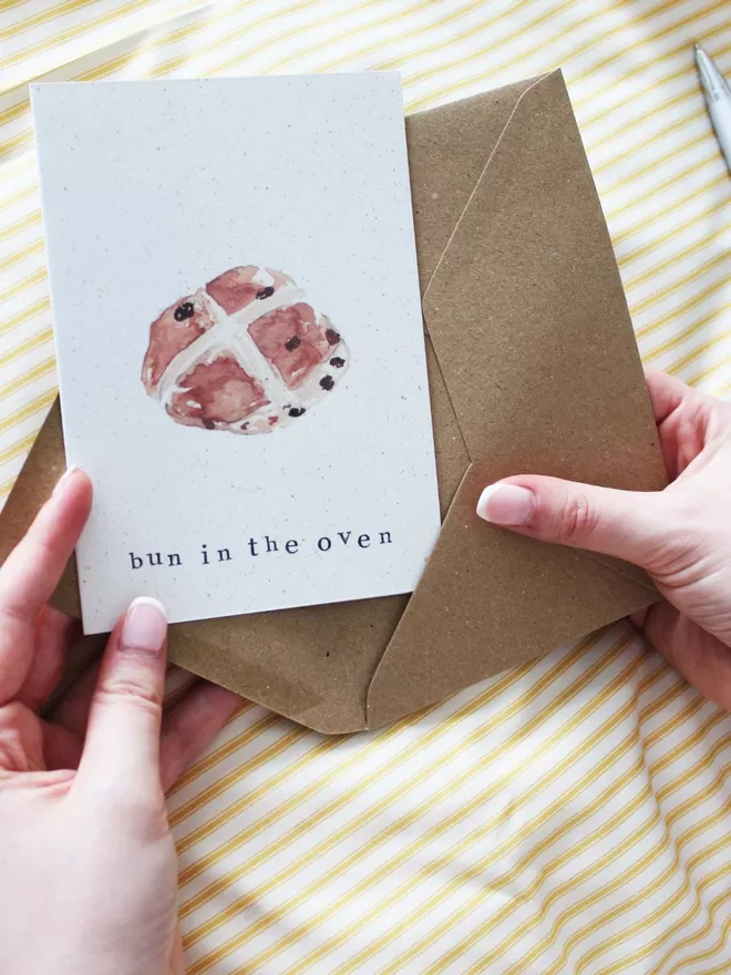 'Bun In The Oven' Card being taken out of envelope