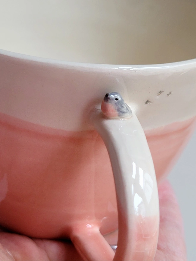 ceramic pink cup with tiny rose robin bird on the handle and birdprints