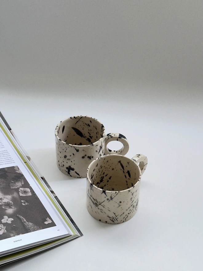 Black speckled modern ceramic mug