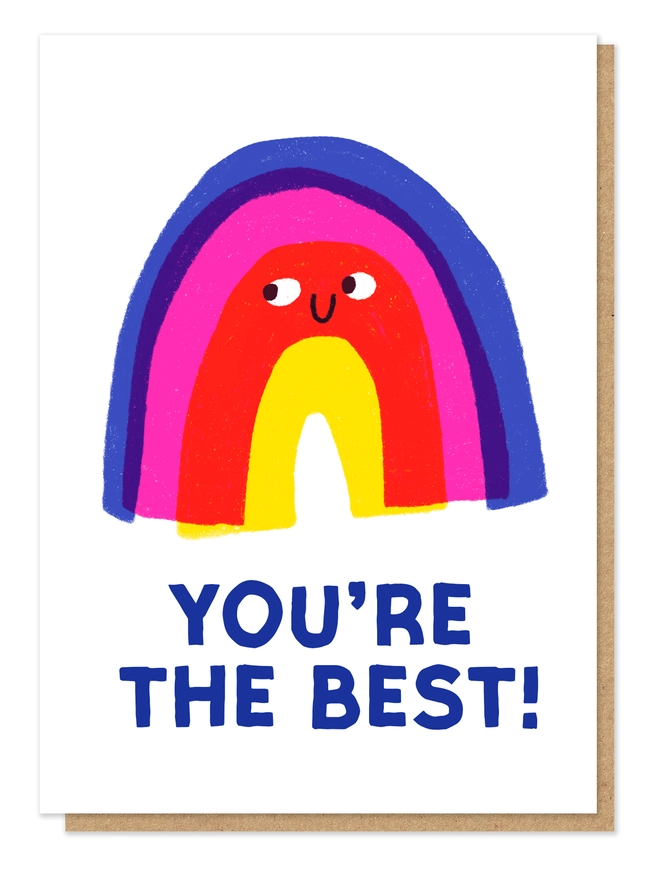 Letterpress card showing a blue, pink, red and yellow rainbow with a smiley face. The wording underneath says "You're The Best!" in blue ink.