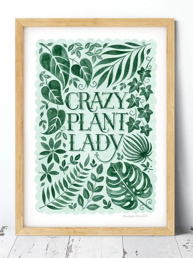 green watercolour crazy plant lady print in wood frame