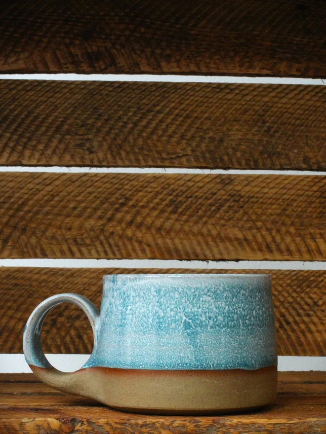 teal handmade ceramic cup