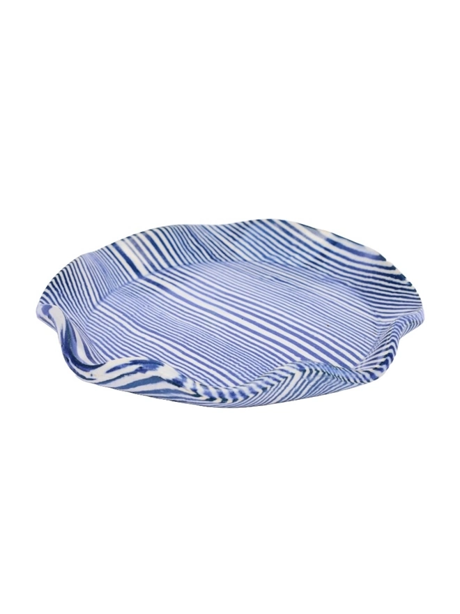 Striped Trinket Dish, a colourful trinket dish sitting on a white surface against a plain backdrop.