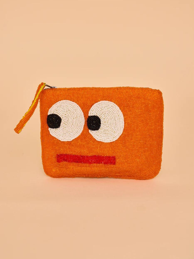 orange beaded mini clutch bag with big beaded eyes