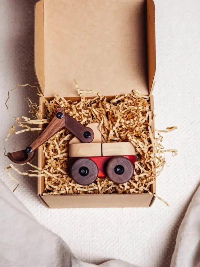 Walnut & Padauk Excavator Wood Heirloom Toy, in packaging. 