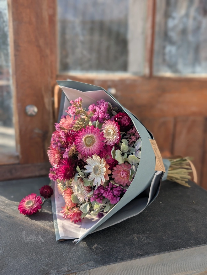 Hand tied flowers on door step
