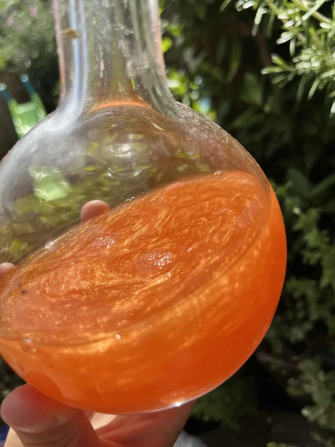 Dino "lava" Simmering orange liquid made from mica and water 