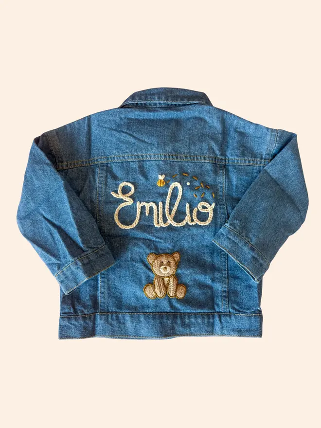 Hand-embroidered denim jacket with teddy bear