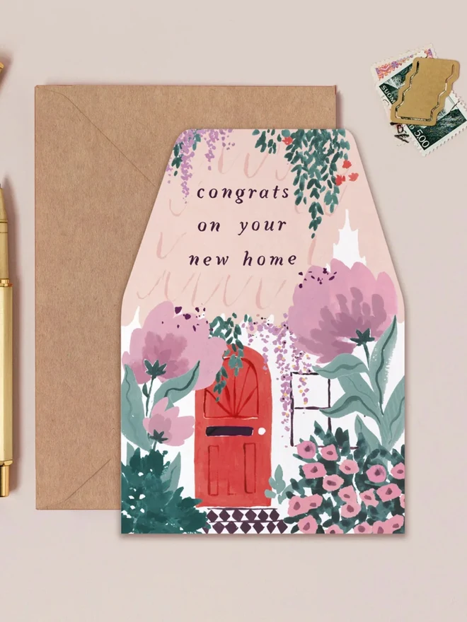 New House Card with a kraft envelope, house-shaped new home card with peonies and a red front door