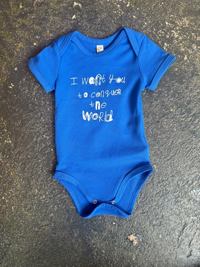 blue baby grow with Pipers unique font in white