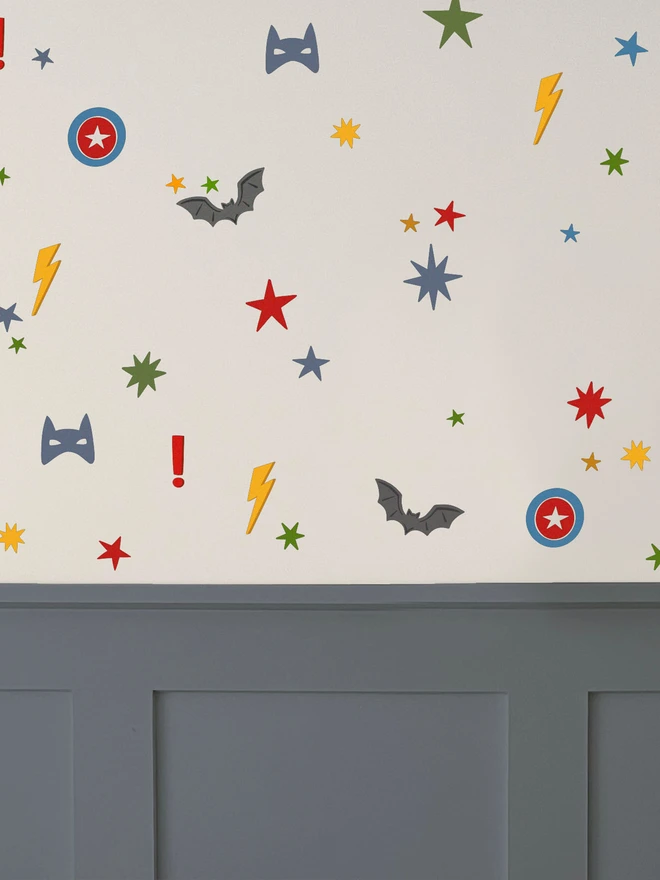 Ducks In A Row Superhero Fabric Wall Stickers in kids bedroom above navy wall panelling