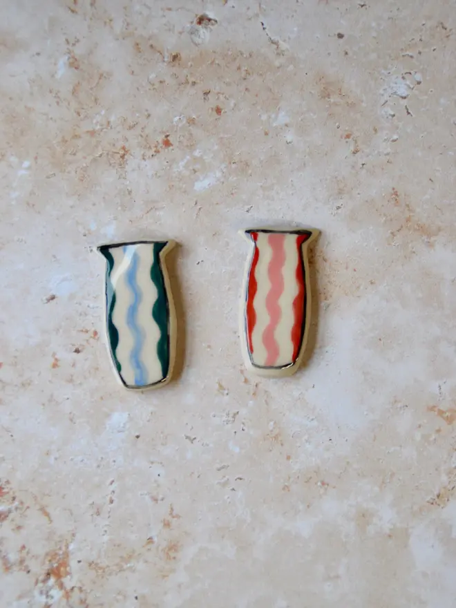 Handmade ceramic vase magnets — red and blue wavy stripe design