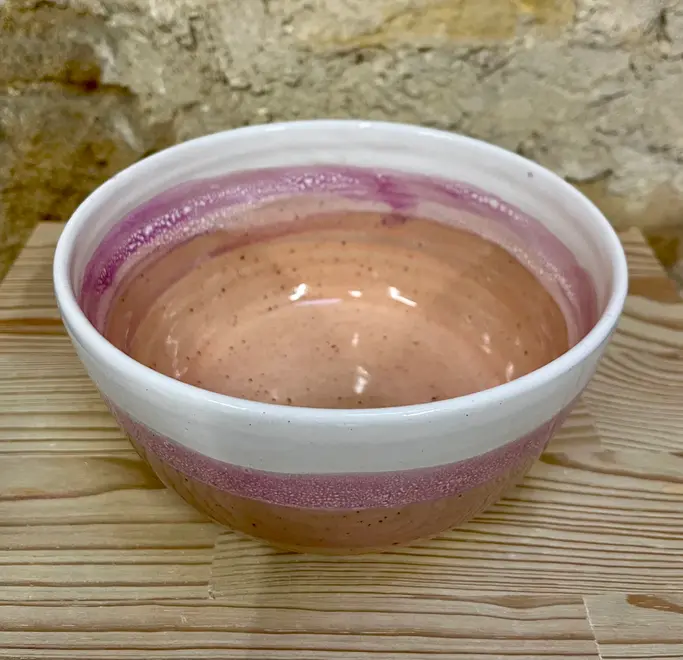 Ice Cream Sundae Ramen Bowl, a colourful ramen bowl sitting on a wooden surface against a brick backdrop. 