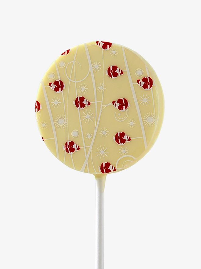 A white chocolate lollipop with a festive Christmas design