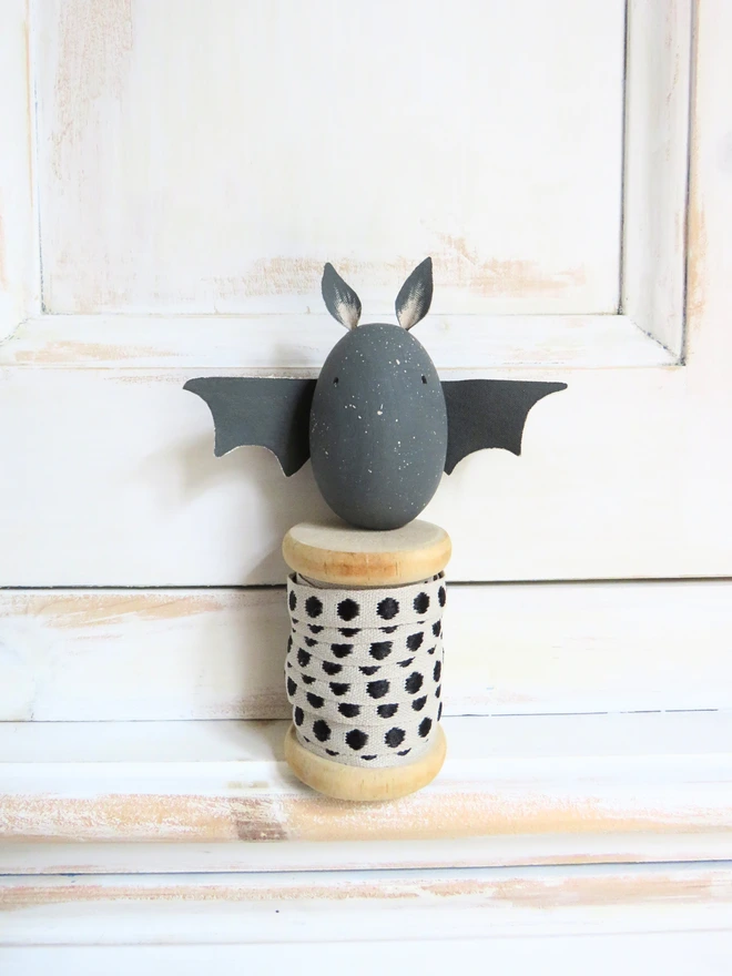 hand painted wooden bat decoration with painted cotton ears and wings