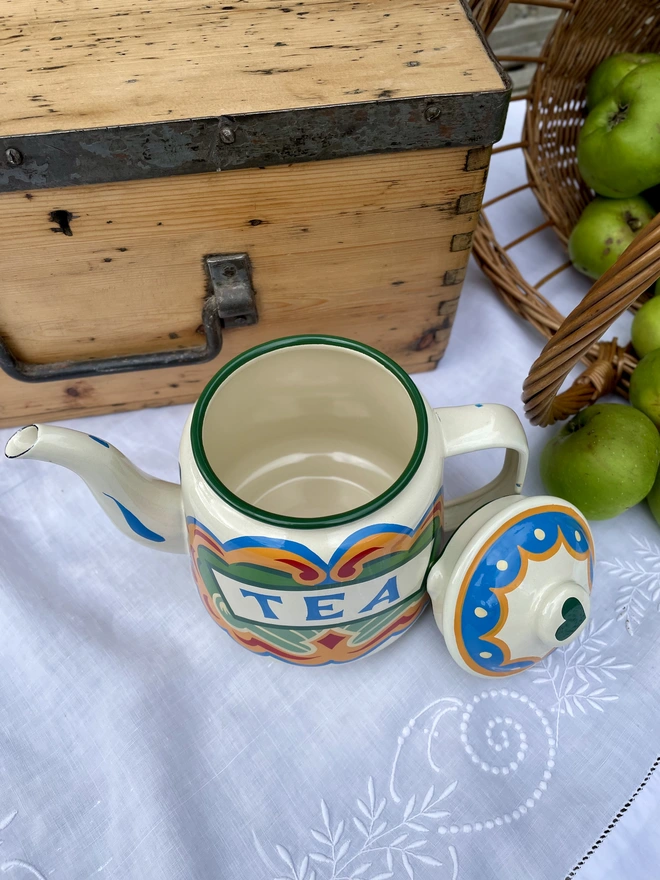 Inside of cream teapot shows the enamel is in excellent condition