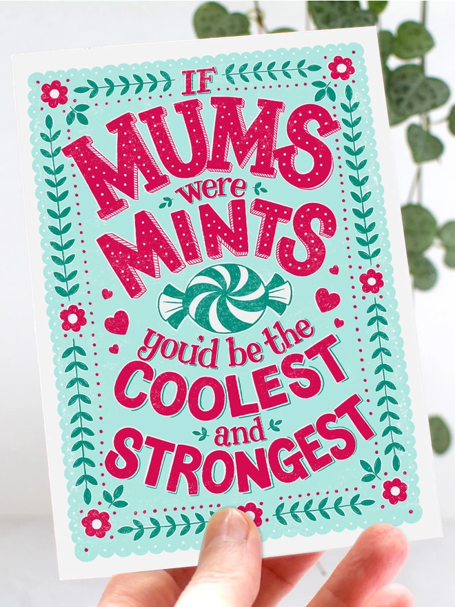 hand holding cool strong mum pink and green card