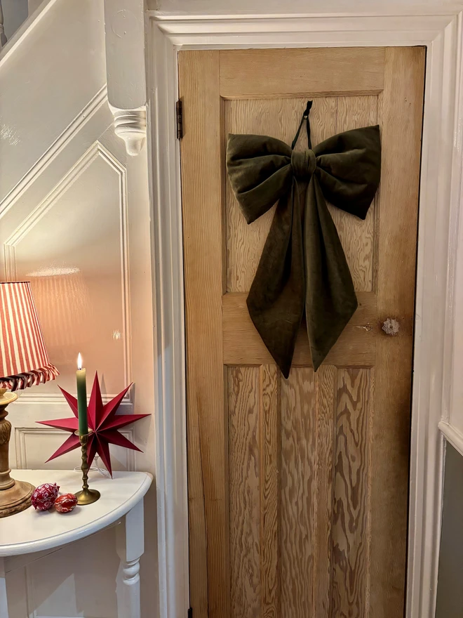 Green velvet oversized bow