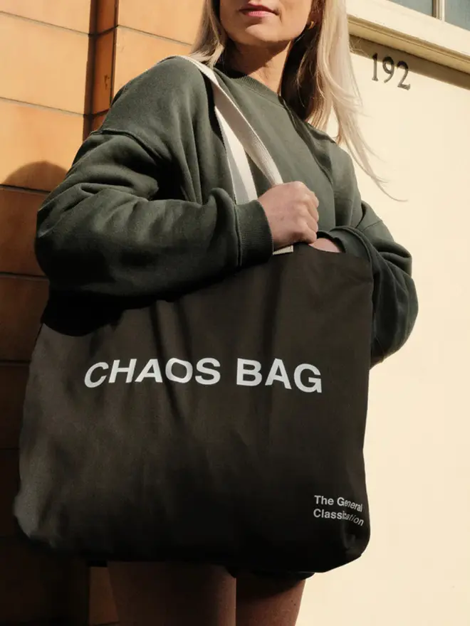 'Chaos' Tote Bag, being worn. 