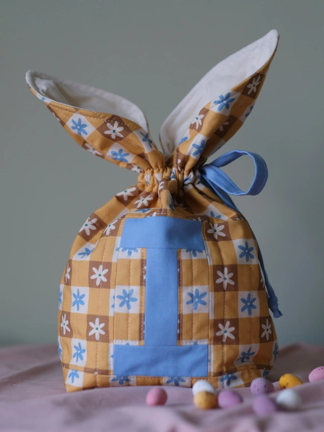 Cooper and Fred personalised easter bunny bag in floral gingham print with cornflower blue letter