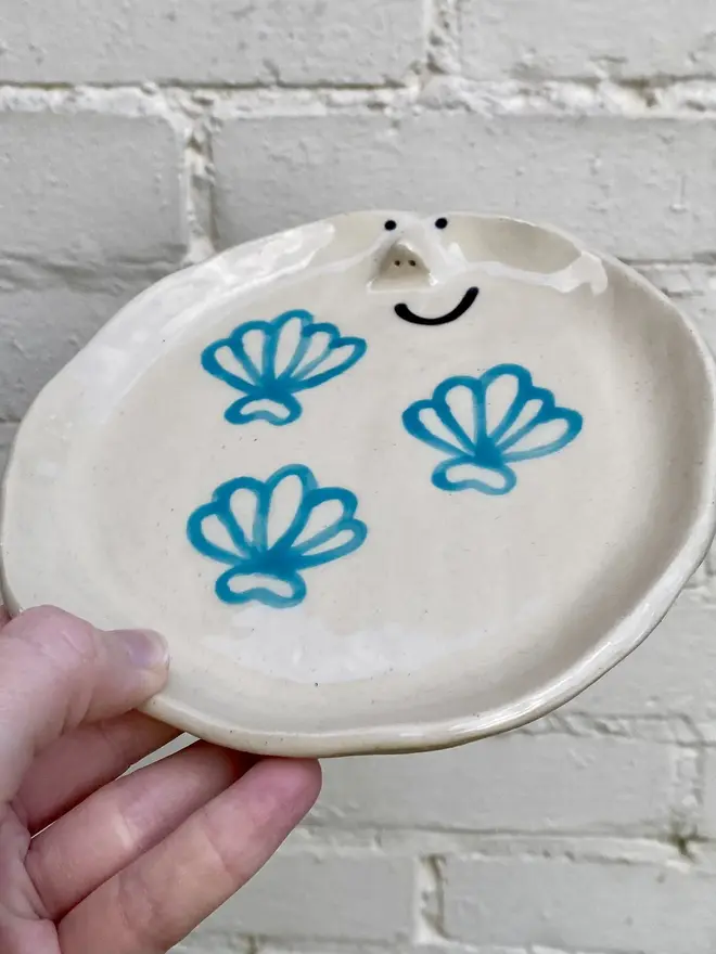 handmade ceramic shell smiley face plate