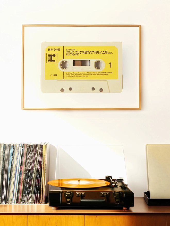 neil young harvest cassette tape print. framed print hung up above record player and vinyl collection.