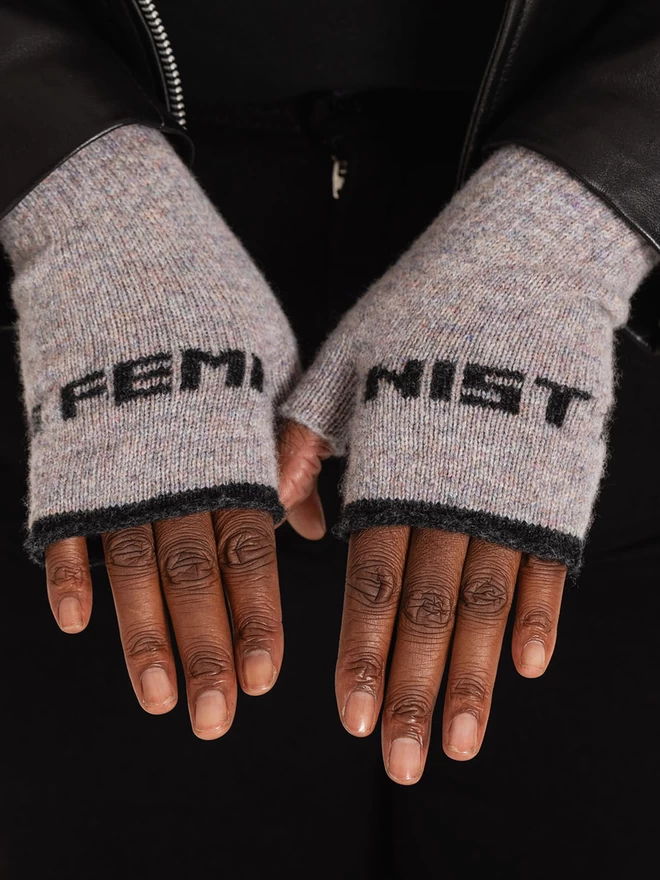 Opal mittens on a black woman 