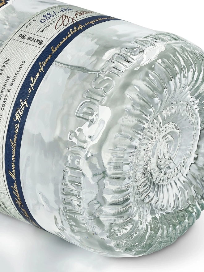 Original Edition Gin, a bottle of gin sitting on a plain white surface. 