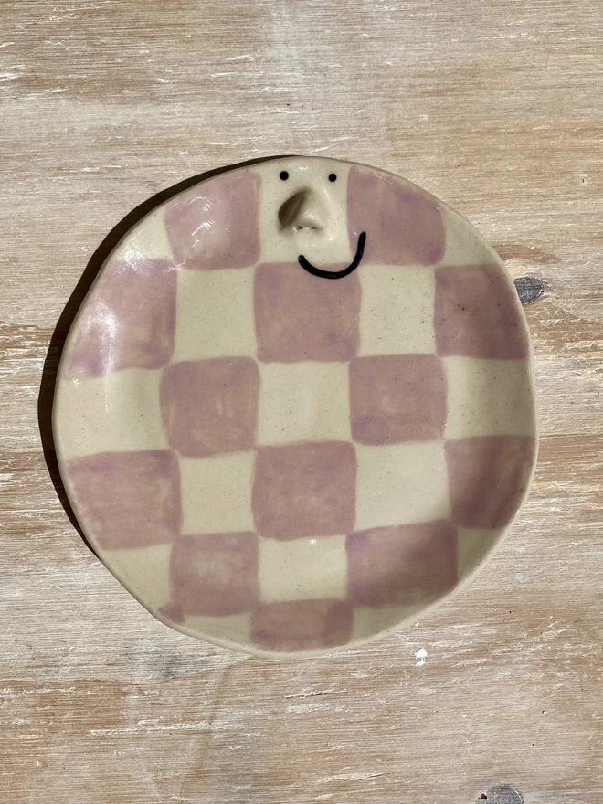 violet ceramic side plate - front on