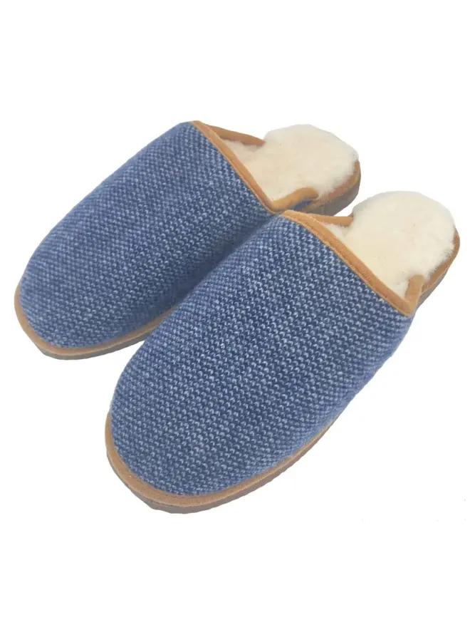 Women's Lambswool & Sheepskin Slippers, a pair of colourful slippers sitting on a white plain surface. 