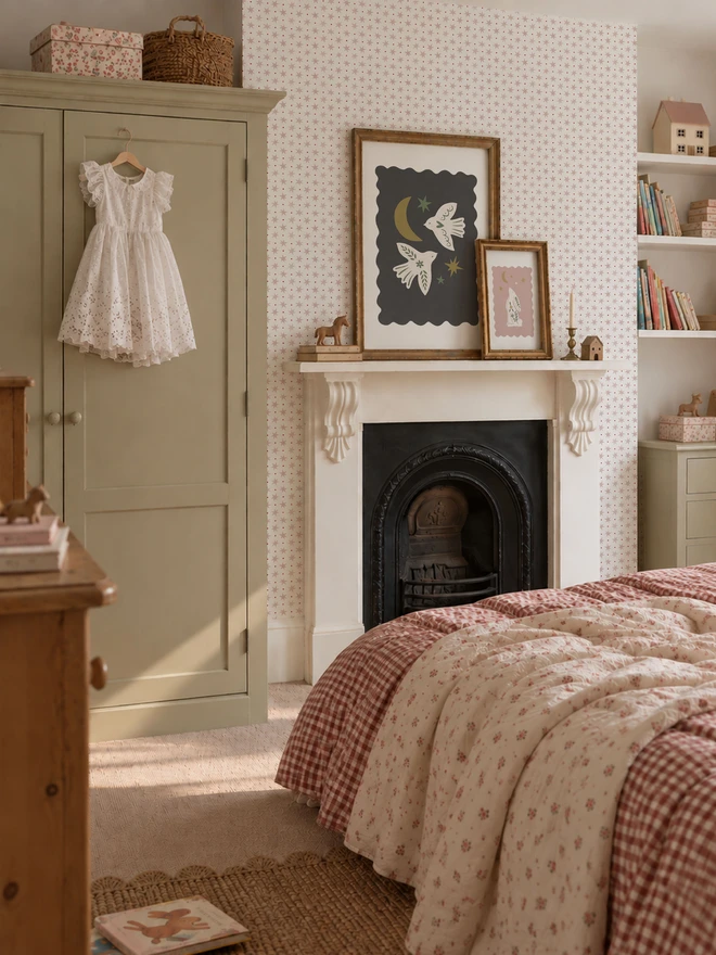 Ducks In A Row Stars & Spots Blush Wallpaper in Girls bedroom with fireplace