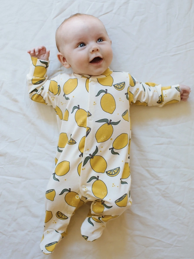 Organic Cotton Baby Sleepsuit in Cream " Lemon Grove " print