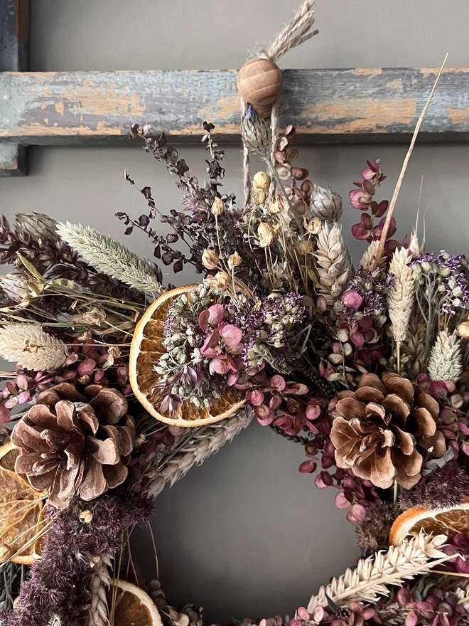 Cosy Winter wreath hanging on wall 