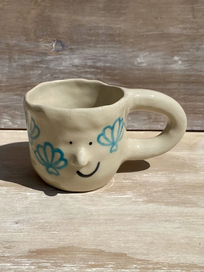 shell ceramic mug front