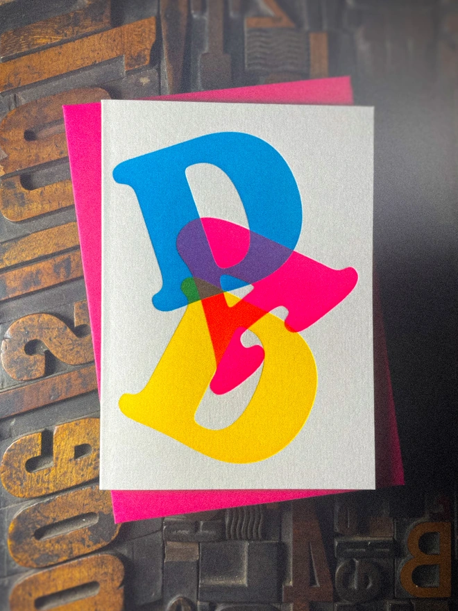 Fathers day typographic letterpress card with fluorescent ink. Deep impression print. Unique with no print being the same. Vibrant colours with matching premium envelopes. With luxurious contrasting coloured envelopes.