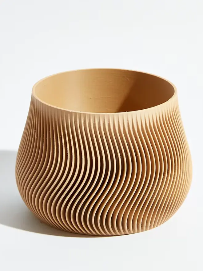 Sustainable 3D Printed Sand Beige Plant Pot, groovy design against a white background.