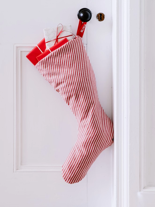 red and white candy stripe linen christmas stocking