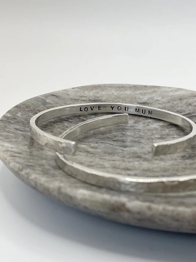 These personalised cuffs bangles are hand made from recycled sterling silver, with options to add initials, names or quotes - a thoughtful gift for mum, a friend or for yourself. Plus a perfect present for those who want to shop mindfully and sustainably. Made by Celina C Jewellery, a small business in the UK, find on Holly & Co.