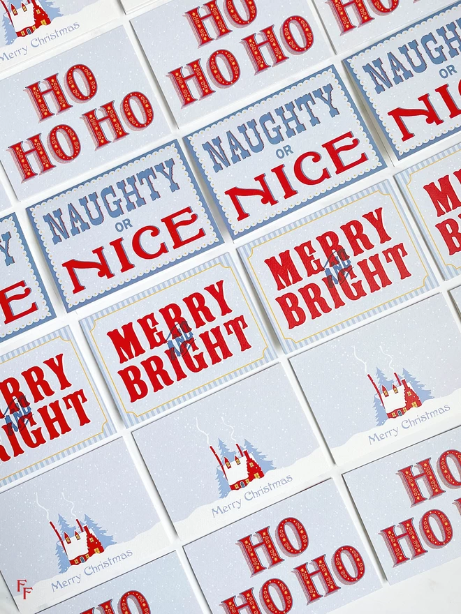 vintage typography and hand lettered christmas cards in blue and red