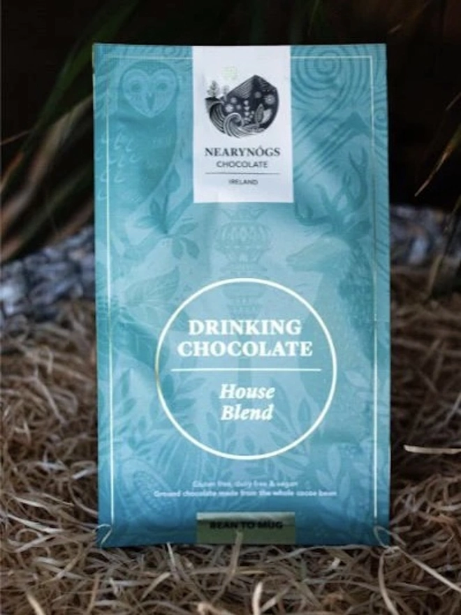 Drinking Chocolate 60% (Pack Of 200g/ 1kg), a packet of drinking chocolate sitting outside. 