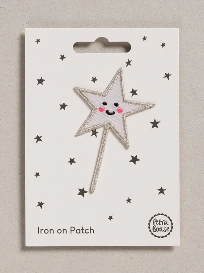 Star wand embroidered fabric patch.