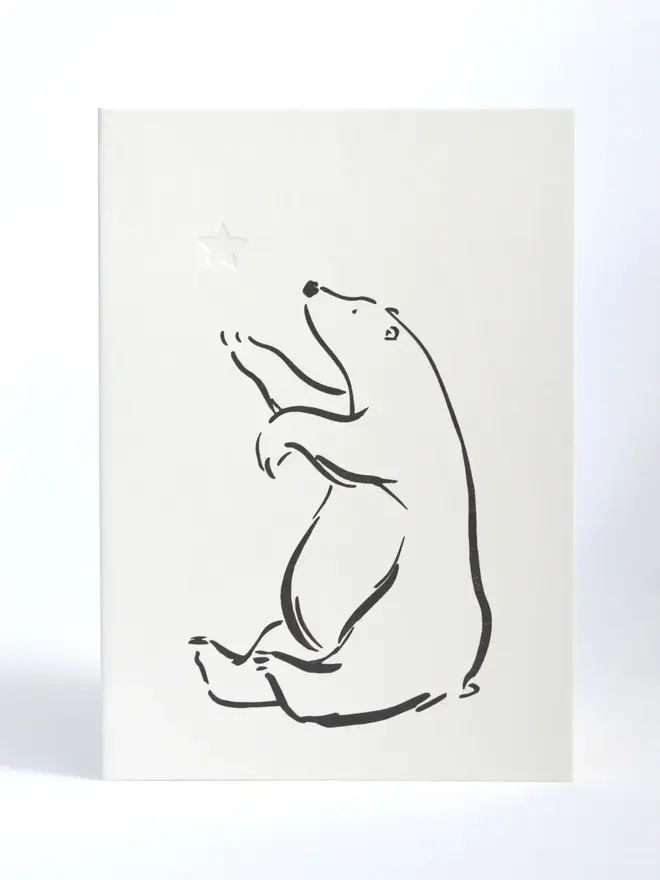 Letterpress Printed Polar Bear & Star. Black print on white background. 