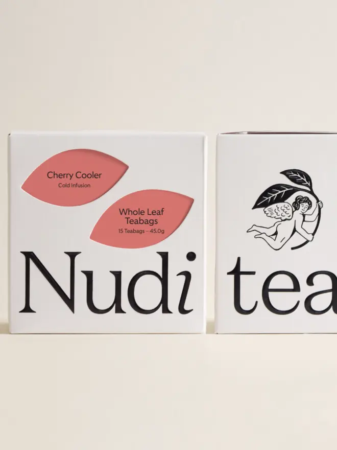 white box of tea with cherry red design