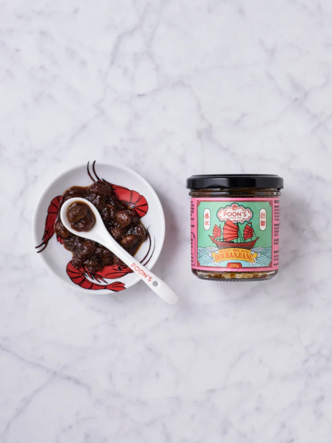 Soy Bean Doubanjiang. A jar of sauce with a sample in a dish.