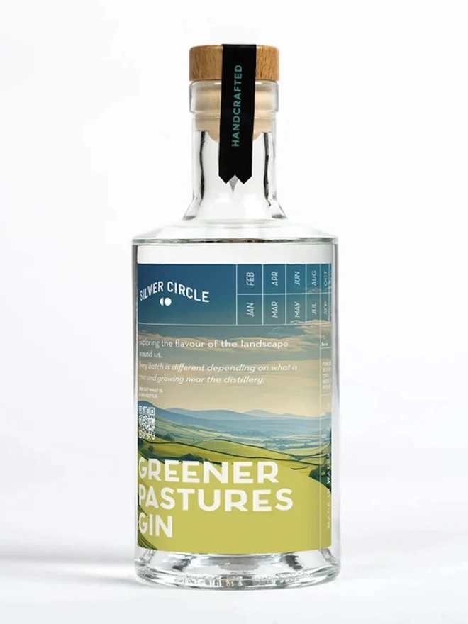 Greener Pastures Gin - Batch 2, bottle of spirit on a white surface. 