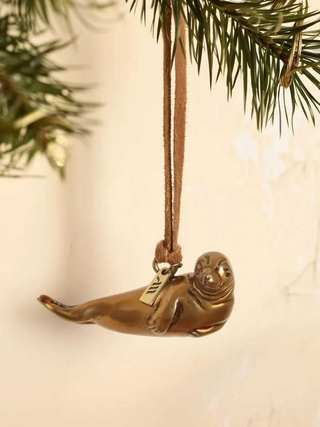 Seal Christmas Hanging Decoration hanging from festive branch