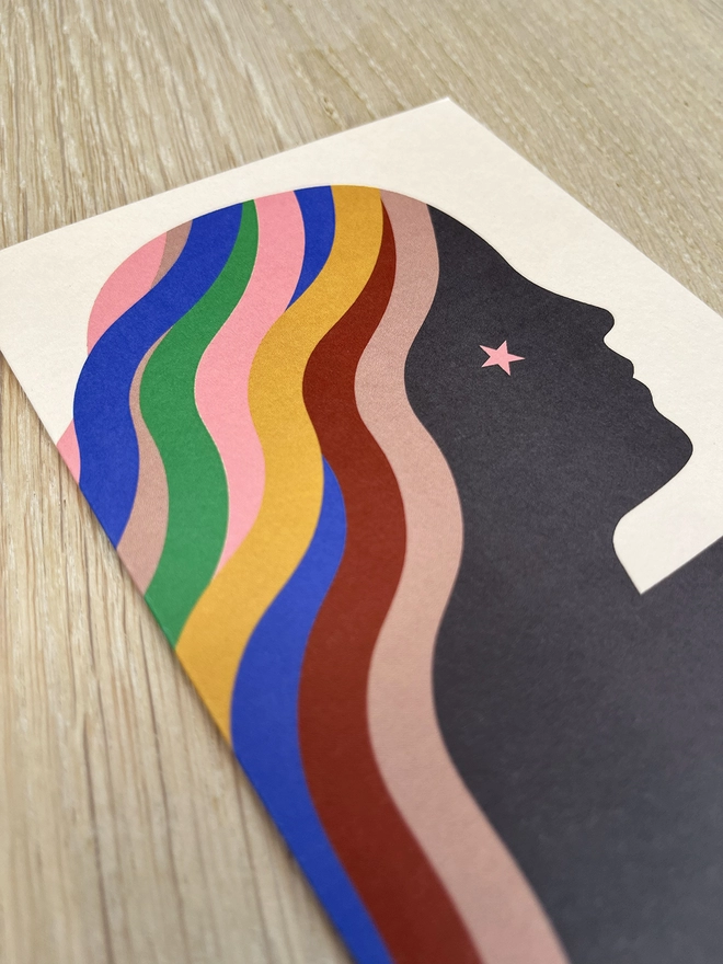 Greetings card with a girl in profile and brightly coloured hair