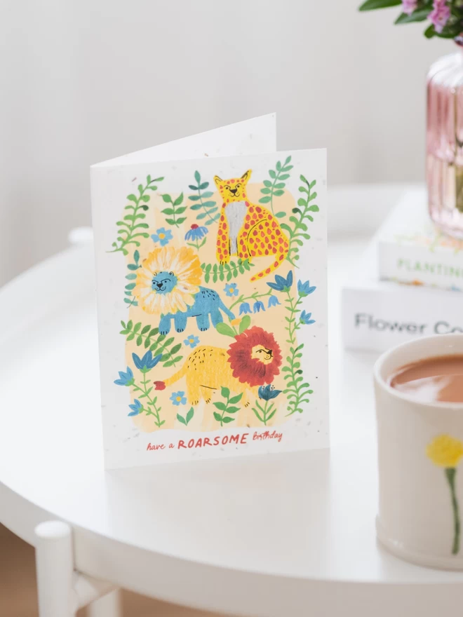 Roarsome birthday plantable card on white coffee table