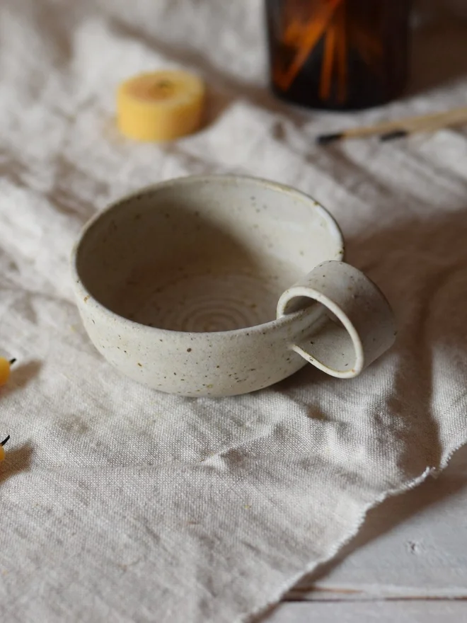 stoneware candle holder with handle